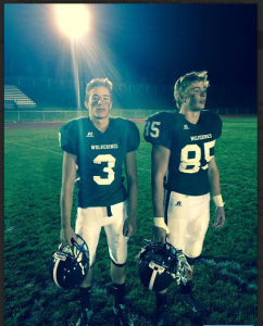Junior athletes, the Quarter Back and Tight End from Wood River High School after their year-end game. 